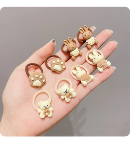 Detail of 8pcs cute cartoon bear and bunny hair ties in brown and cream resin