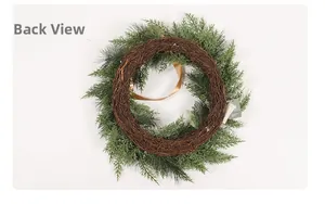 Rear view showing natural rattan base and pine needles of the Christmas wreath