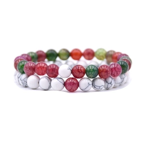 Detail of 8mm natural stone elastic bracelets with red green and white marbled beads