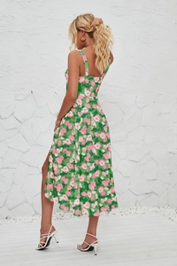 Detail view of the floral sleeveless dress showing the back cut and side slit feature