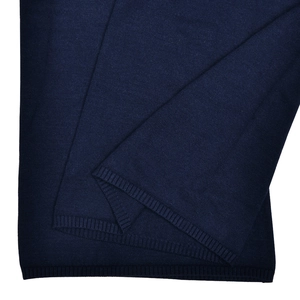 Detailed close-up showing the premium ribbed knit texture and navy blue fabric finish