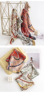 Floral satin square scarves hanging with vintage baroque patterns in vibrant colors