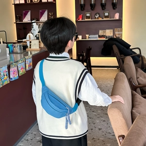 Sky blue canvas crossbody chest bag for kids with half-moon shape and braided zipper