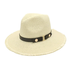 Retro panama straw hat with frayed edges and golden H buckle for sun protection