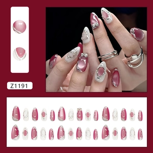 Deep pink cat eye press-on nails with silver 3D liquid metal butterfly designs