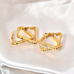 Minimalist 18K gold plated triangle earrings with colorful zircon crystals on white silk