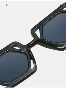 Detail of comfortable one-piece nose pads on black square frame sunglasses with hollow design