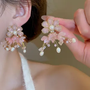 Pink flower earrings with freshwater pearls and tassels in a sweet, elegant style