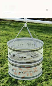 Detail of double-layer drying net with fine mesh and decorative stars for sweaters