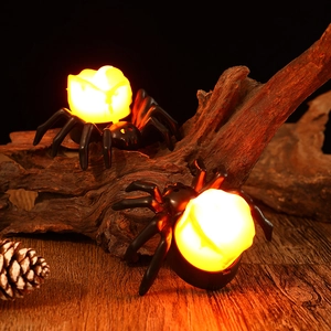 Halloween LED spider candle light with glowing orange bulb for spooky party decoration