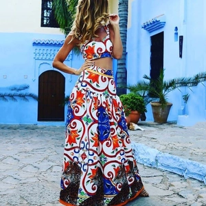 Bohemian floral and leopard print two-piece set with halter crop top and maxi skirt