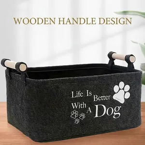 Felt pet storage basket with wooden handles and Life Is Better With A Dog slogan print