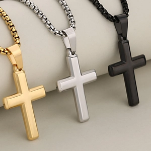 Minimalist stainless steel cross pendants set in gold, silver and black finishes