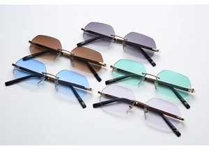 Detail view of rimless octagonal sunglasses in five gradient colors with wood grain temples