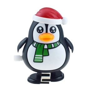 Pinguino giocattolo a carica con cappello di Natale rosso e sciarpa a righe verdi
