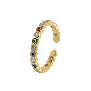 Adjustable gold evil eye ring with colorful enamel and sparkling zircon stones on white base