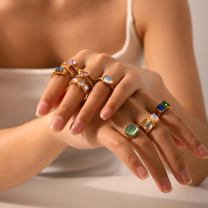 French vintage stainless steel rings with colorful zircon and moonstone on a hand