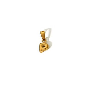 Detailed view of bubble initial P pendant in 18k gold plated stainless steel finish