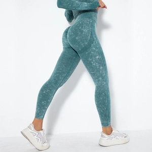 Detail of seamless scrunch butt yoga leggings in stone wash teal with ribbed texture