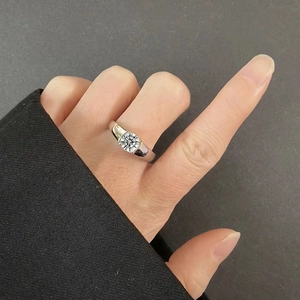 Detailed view of a silver classic engagement ring with a round brilliant cut solitaire stone