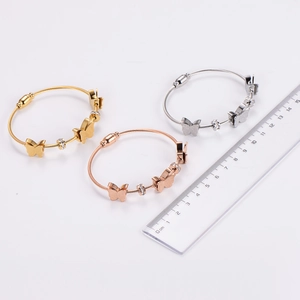 Three-tone wire rope butterfly bracelets in gold, rose gold and silver with zircon accents