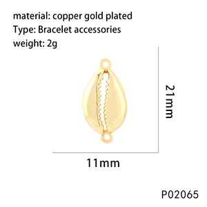 Detailed macro view of 21mm gold plated seashell charm with zircon stones for bracelets