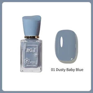 Detail view of 14ml foggy milk blue nail polish bottle and solid color swatch for manicure