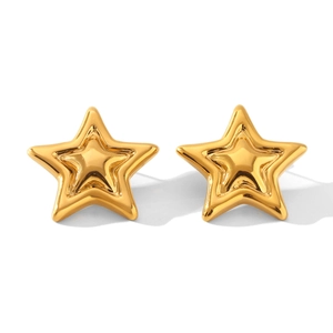 Detailed view of 3D gold star-shaped stainless steel earrings with glossy finish