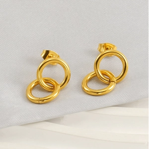 Polished gold interlocking double hoop earrings in geometric stainless steel style