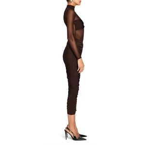 Detail of sheer mesh patchwork and side ruched texture on a dark brown bodycon midi dress