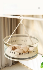 Detail of hanging drying basket with fine mesh, zipper opening and sturdy top hook