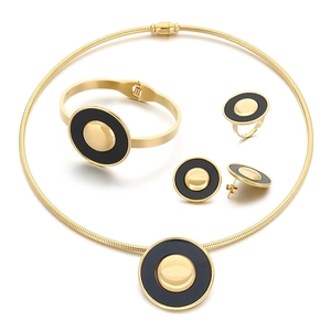 Luxurious gold stainless steel jewelry set with black enamel round pendants and polished domes