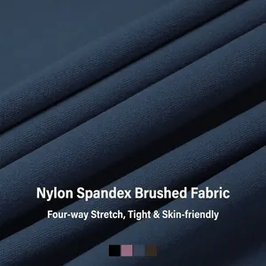 Brushed navy yoga tank top with dual straps featuring 4-way stretch fabric and a soft finish