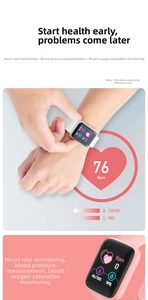 Detail view of pink and white smartwatches showing heart rate and blood oxygen monitoring
