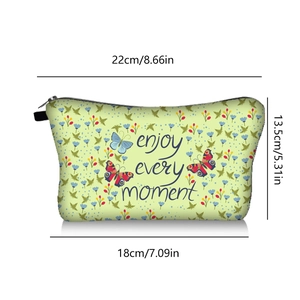 Detail view of butterfly print makeup bag with zipper and enjoy every moment text