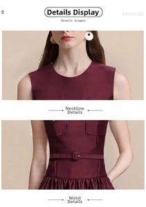 Détail de robe sans manches bordeaux montrant le col rond et la ceinture assortie