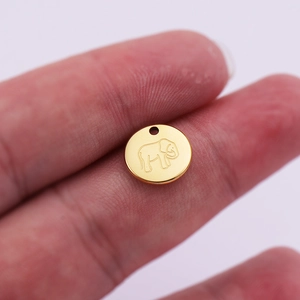 18K gold plated stainless steel round pendant with engraved elephant design charm