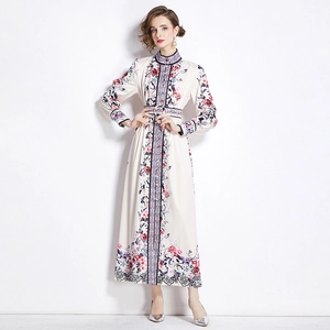 Elegant floral print maxi dress with high neck and long sleeves on a white background