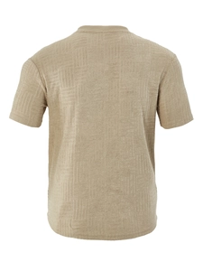 Rear view of sand beige short sleeve polo shirt featuring a textured jacquard knit pattern
