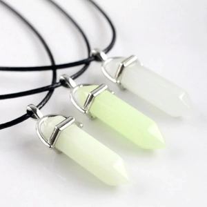 Luminous hexagonal crystal pillar necklaces with glowing green pendants on black cords