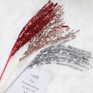 Sparkling firework sequin branches in red, gold, and silver for DIY Christmas decoration