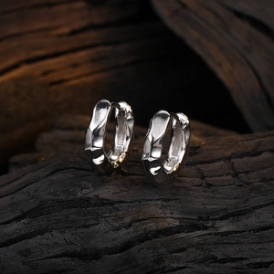 Irregular textured silver hoop earrings with vintage minimalist design and S925 stamp