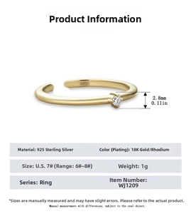 Detail view of adjustable 925 sterling silver ring with 18K gold plating and mini diamond