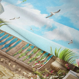 Detail of fabric texture with floral garden print and blue sky scenery on wall tapestry