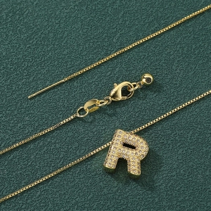 Gold letter R pendant necklace with cubic zirconia and delicate box chain