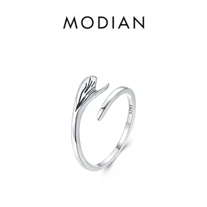 Adjustable S925 sterling silver ring featuring a detailed fishtail design with a polished finish