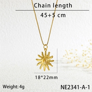 Detail view of gold sun pendant necklace showing 18x22mm size and 45+5cm chain specs