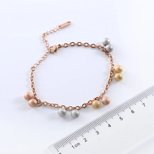 Three-tone stainless steel beaded bracelet with sandblasted texture and lobster clasp