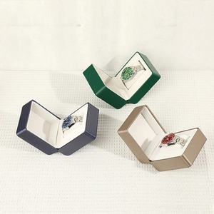 Three premium PU leather watch display cases in green, blue, and champagne gold colors