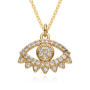 Macro view of 18K gold plated evil eye pendant with micro-set zircon stones